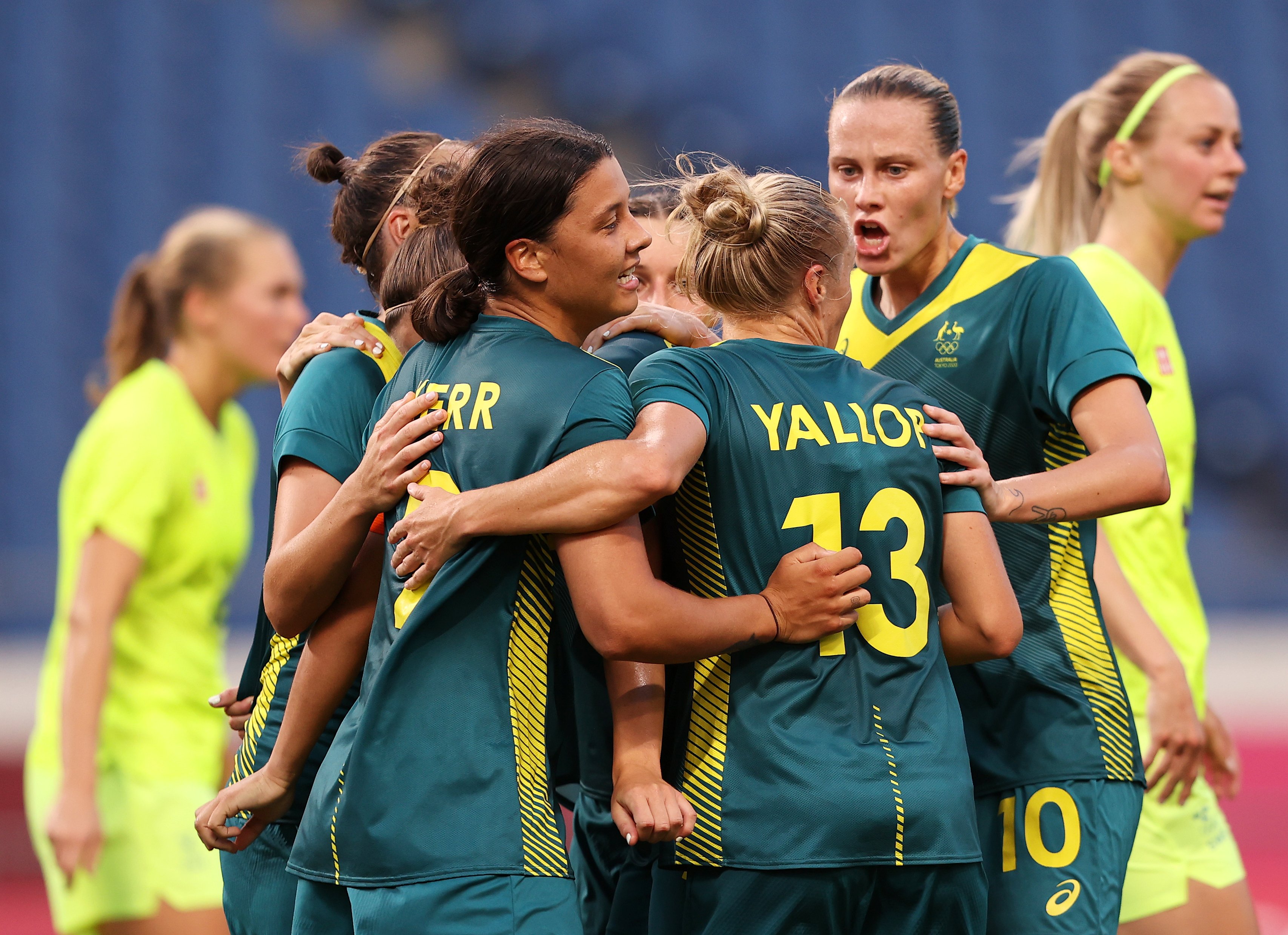 Tameka Yallop and her teammates celebrate