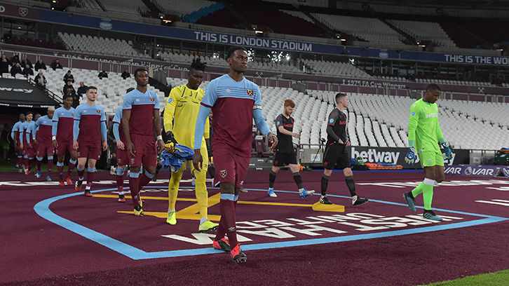 Olatunji Akinola leads the U23s out against Stoke U23s at London Stadium